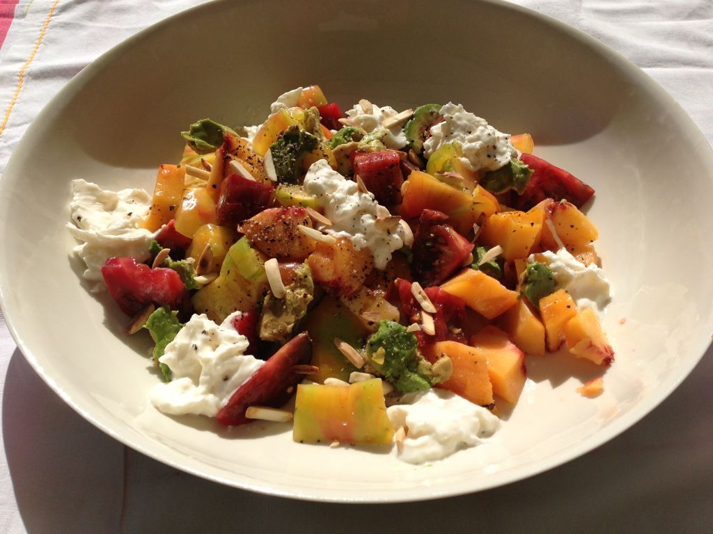 This is my favorite summertime salad. It all comes together whenever I can get the fresh ingredients all in place. The peaches are the key !